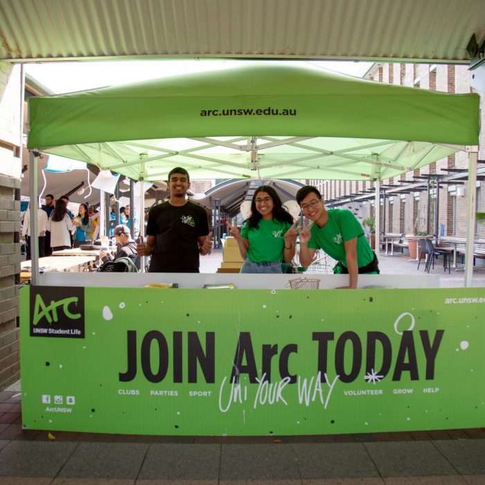 Photograph of potential students socialising and browsing the UNSW campus