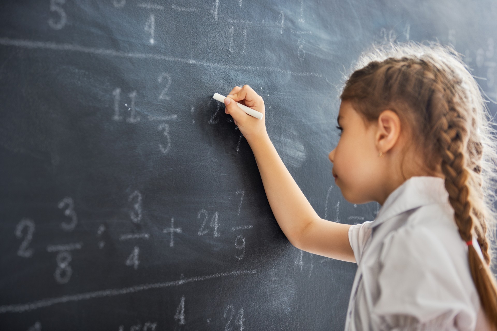 girl at chalkboard