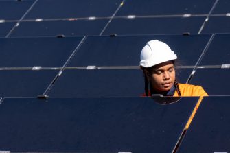 First Nations Woman working at a solar farm