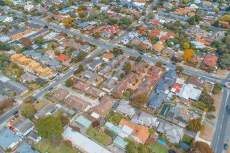 Aerial view - looking down at houses and strees in suburbia