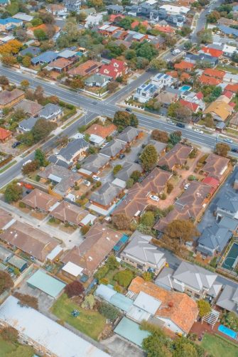 Aerial view - looking down at houses and strees in suburbia