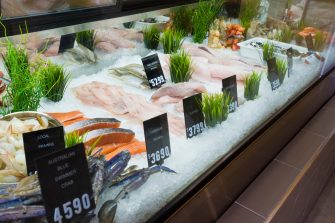 Display of seafood with price tags in a shop in Melbourne, Australia