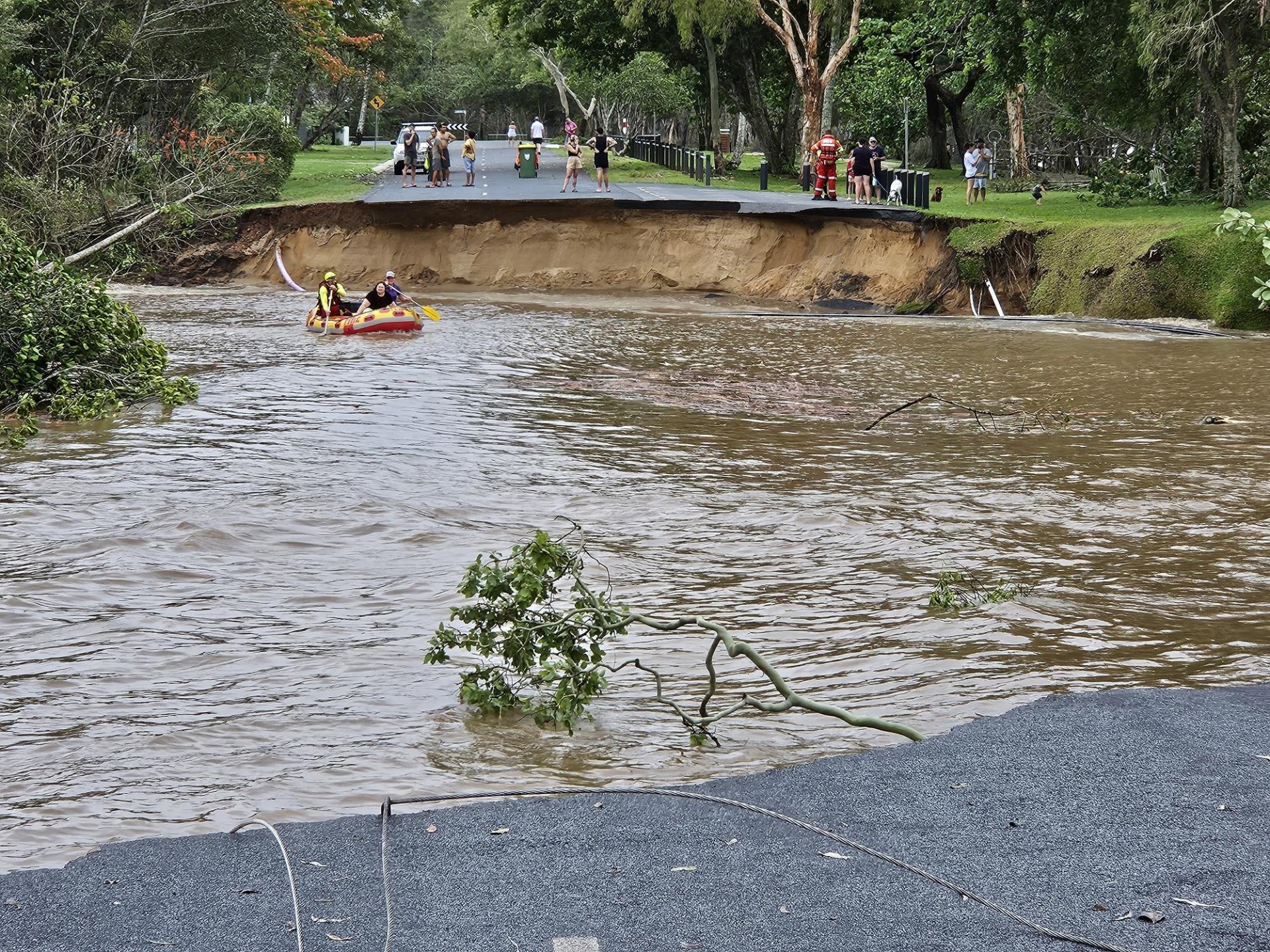 Personnel conduct search and rescue operations in the flooded area in Queensland, Australia on December 18, 2023. More than 300 rescued from floodwaters. Photo via Getty Images