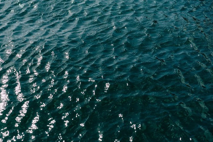 Blue lake water with waves