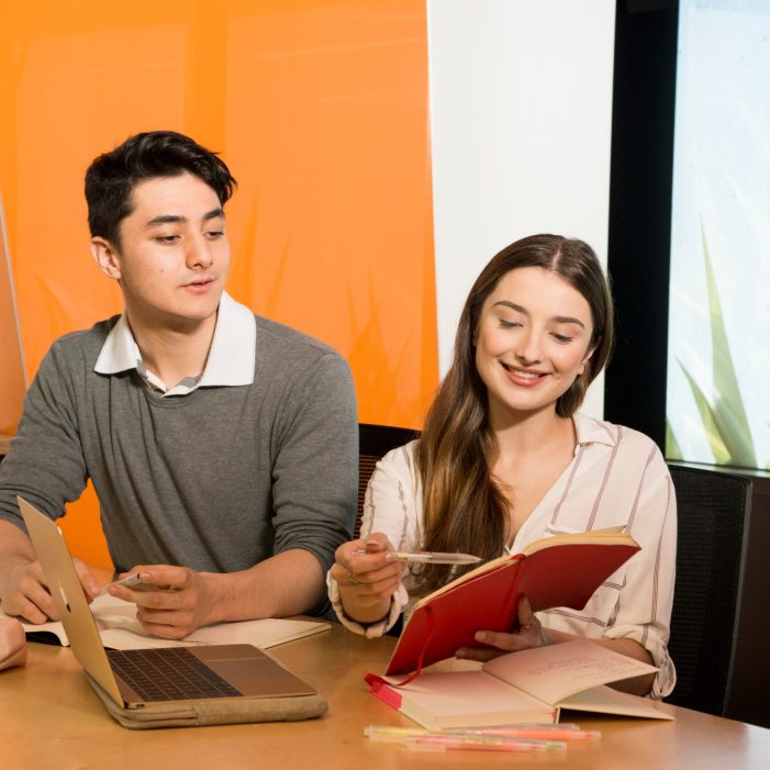 Office workers working around the office