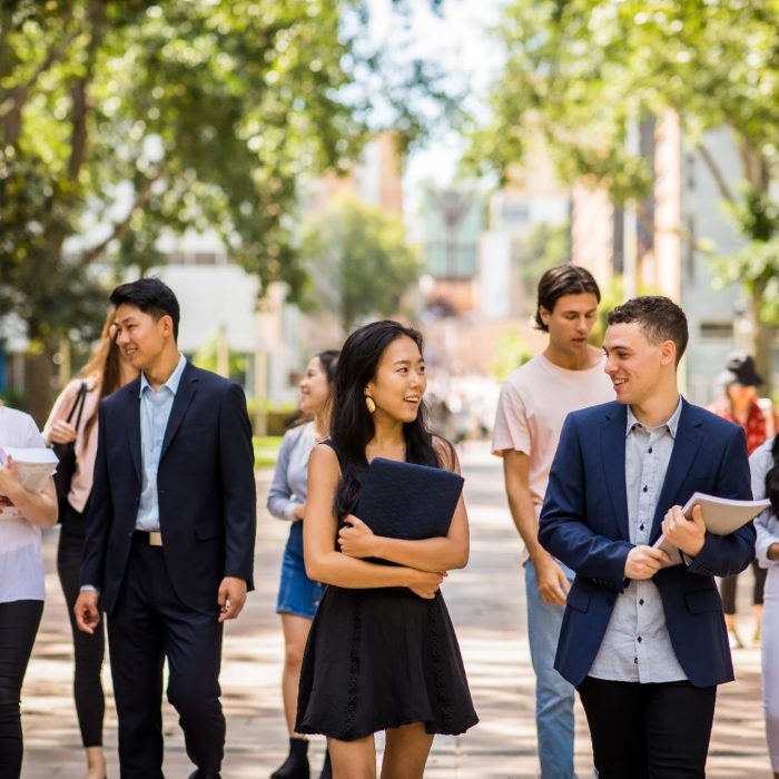 Students walking down the UNSW main walkway