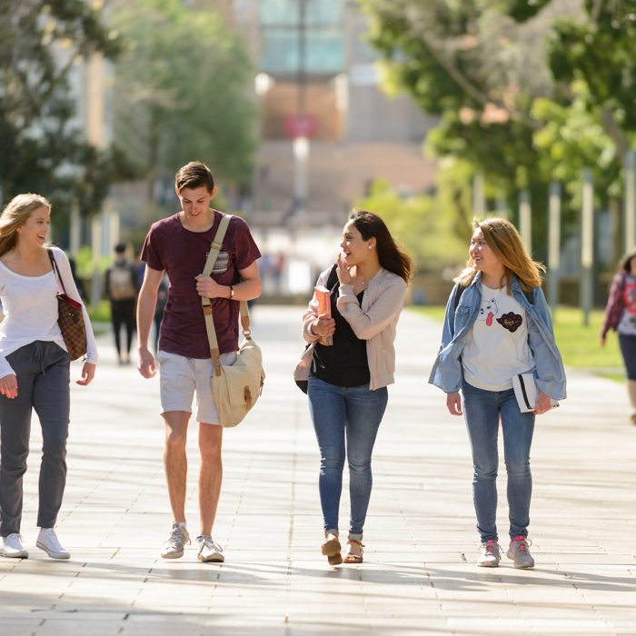 Students walking down the main walkway at the UNSW Kensington Campus