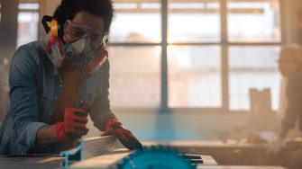 Picture of focused student working with table saw