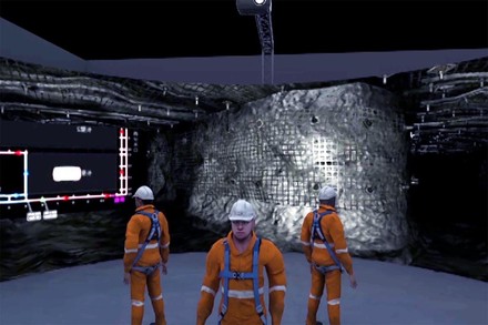 Model of miners in the iCasts virtual environment, a projection of a mine behind them.