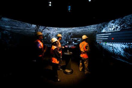 Miners interacting with the mining VR installation